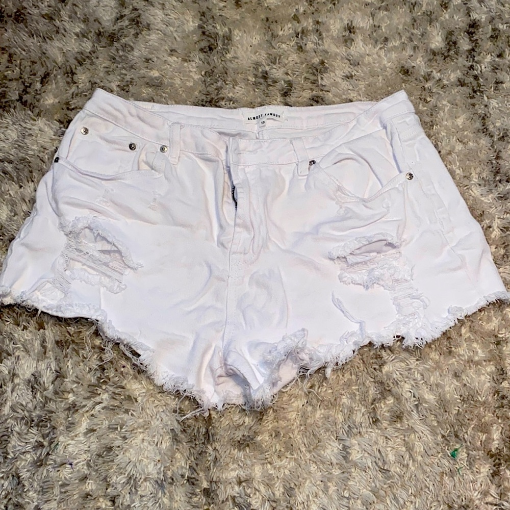White distressed denim shorts